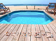 Corasiida Guest House – Pool und Meer 