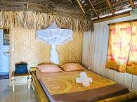 Pension Tikehau Village – Bungalow innen 
